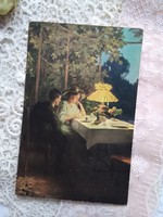 Antik romantikus képeslap/művészlap, pár, esti teázás a szabadban, lámpafény 1916