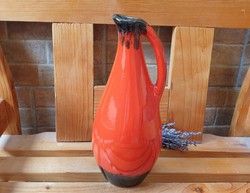 A vase pouring a rare brandy