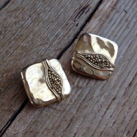 Old gold colored modernist metal clip earrings
