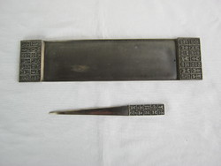 Retro craftsman with metal tray and letter opener