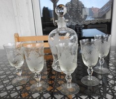 Hand-polished old glass wine bottles with ground glass