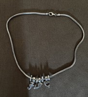 Thick necklace with charms