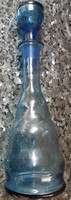 Liquor bottle with blue glass stopper