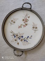 Decorative plate with metal frame and floral patterns