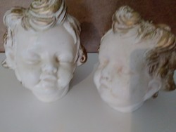 Ceramic putto heads