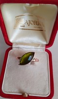 Retro gold colored copper women's ring adorned with polished green oatmeal bushed polished glass stones
