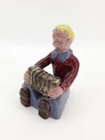 Marked ceramic figurine, accordion boy