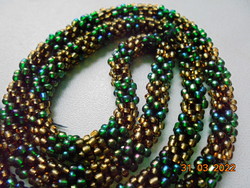 Beaded crochet rope necklaces with lots of tiny antique gold and emerald green play beads