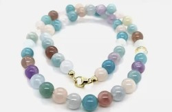 9-carat gold lock, healing chakra necklaces with multi-precious stones.