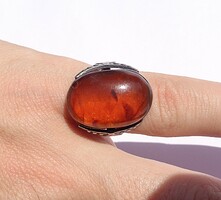 Silver ring with amber stones