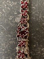 Impressive, beautiful bracelet richly decorated with garnet stones