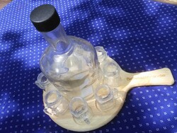 Scnapsrunde brandy glasses offering skull patterned glass bottles