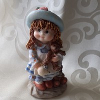 Cute hat doll figure with teddy bear