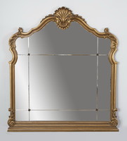 Gilded wooden framed mirror with shells ornament, split interior