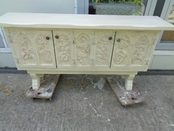 Chest of drawers with carved doors