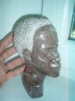Vintage carved African statue portrait