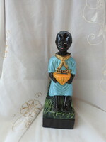Old big emergency box - black kid figurine merci