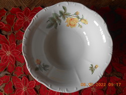 Bowl of Zsolnay yellow rose pattern with garnish and salad