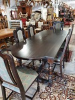 Antique hardwood dining / meeting table with 6 upholstered chairs