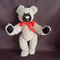 Teddy bear with a big nose, looking for a new owner