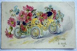 Antique embossed greeting postcard with golden automobiles flowers