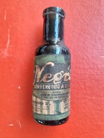 Old labeled bottle of negro skin blackening vintage bottle with leather paint