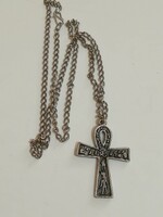 Ankh cross with pendant chain.