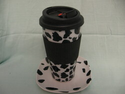 Black and white mug, plastic travel cup with cow pattern and porcelain coaster