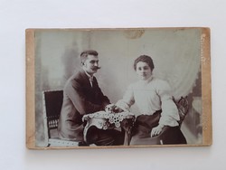 Old photo of a woman, a man, a studio photo of a violinist, Mrs. V. photographer Szentes