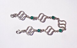 19.9 cm. Long, 1.5 cm. Wide silver bracelet with four green stones