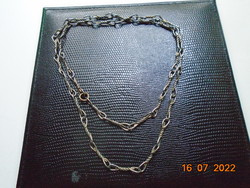 Steel necklace for men inspired by industrial shapes