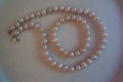 Exclusive brand new freshwater cultured pearl set, strung with giant eyes.
