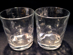 A pair of polka dot candle holders