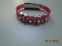 Modern pink wrist strap kata decorated with silver-plated, stone-encrusted letters