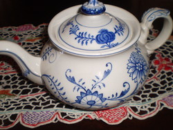 Antique teapot spout