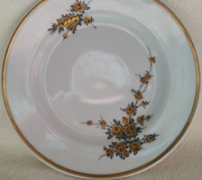 Arany színű virágmintás tányér