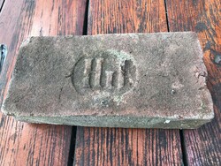 Antique written, broken brick. For decoration, possibly to be installed somewhere. Seller.