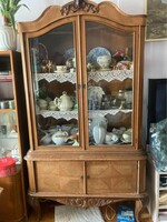 A hundred-year-old, carved display case for sale, without the display items shown in the picture!