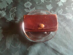 Tiny leather wallet from the early 1900s