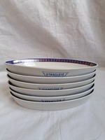 6 oval plates with lowland passenger food.