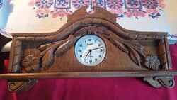 Hand-carved fireplace clock in wonderful condition