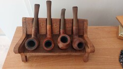 Carved wood, bench-shaped pipe room for 4 pipes.
