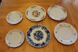 Assorted porcelain plates pouring cups
