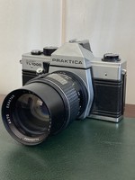 Praktica super tl1000 frame with working + faulty 135mm f2.8 Lens