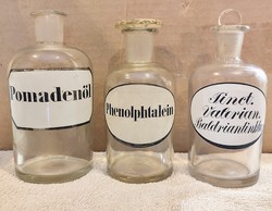 3 antique German pharmacy bottles with painted labels.