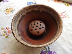 Brown handmade ceramic flower holder for cut flowers