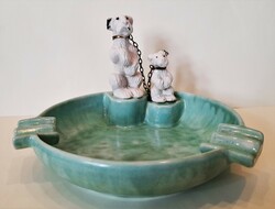 Art deco ceramic ashtray with a mother dog, chained to her with a tickling puppy