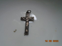 Older cross pendant with a beautifully crafted body