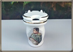 A rare, interesting toilet bowl-shaped French porcelain offering with a portrait of Napoleon