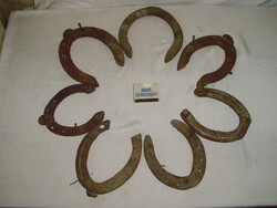 Seven pieces of old iron horseshoes together - for decoration, creative reimagining